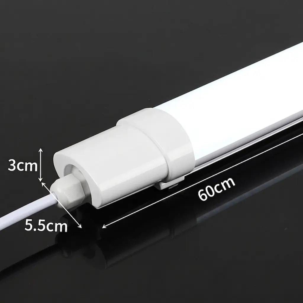 WaBrite IP65 LED Tri-Proof Light dual aluminum linear industrial batten fixtures on water splashed surface showing water resistance