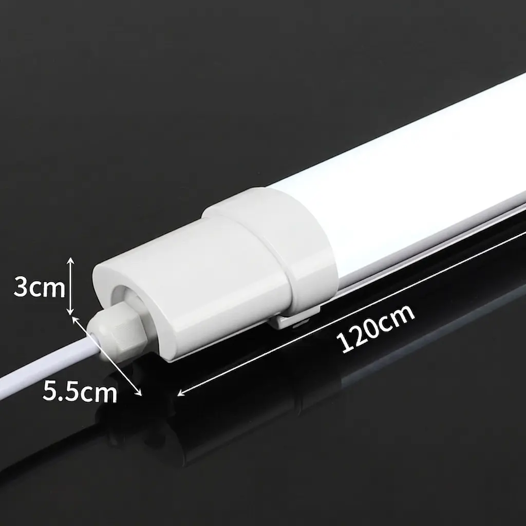 WaBrite IP65 LED Tri-Proof Light dual aluminum linear industrial batten fixtures on water splashed surface showing water resistance