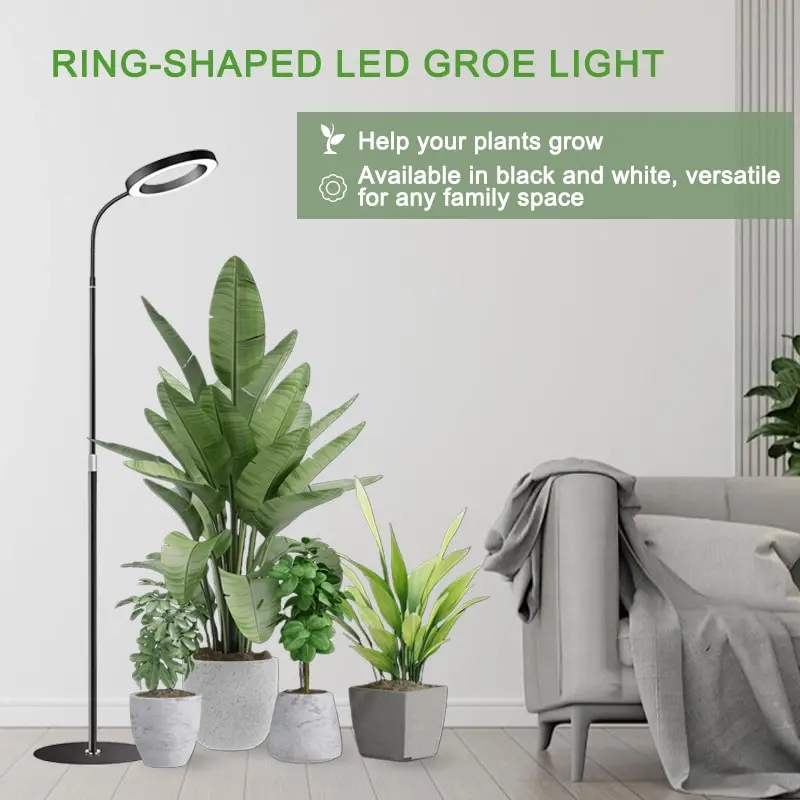 WaBrite full spectrum LED grow light with adjustable telescopic floor stand illuminating indoor plants and monstera.