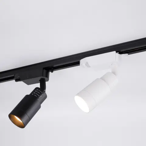 Modern adjustable LED track light, black and white finishes.