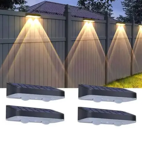 Solar Outdoor Wall Washer Fence Light illuminating a modern garden wall.