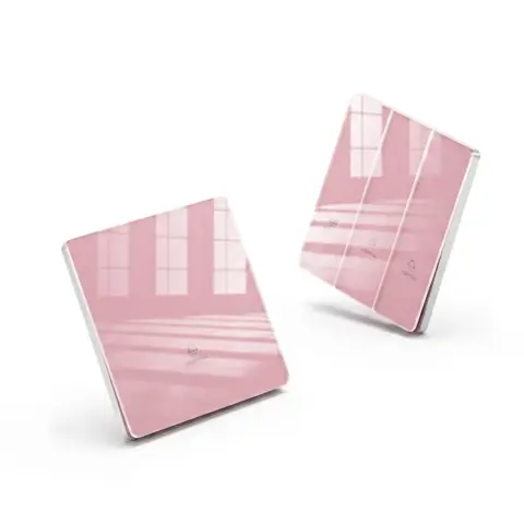 Pink tempered glass wall switch plate with tin phosphor bronze interior