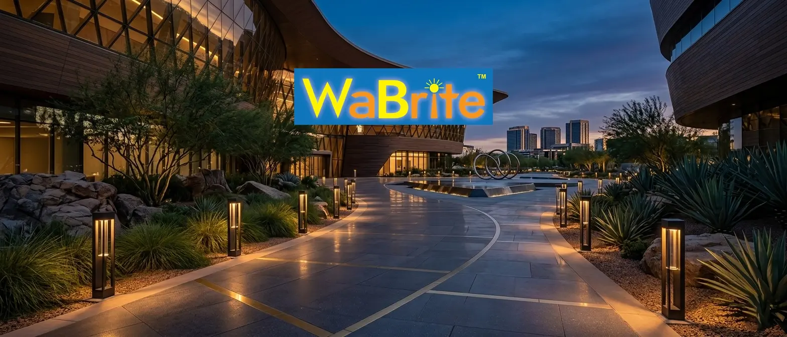Modern architectural solar pathway lighting illuminating a luxury commercial plaza at dusk.